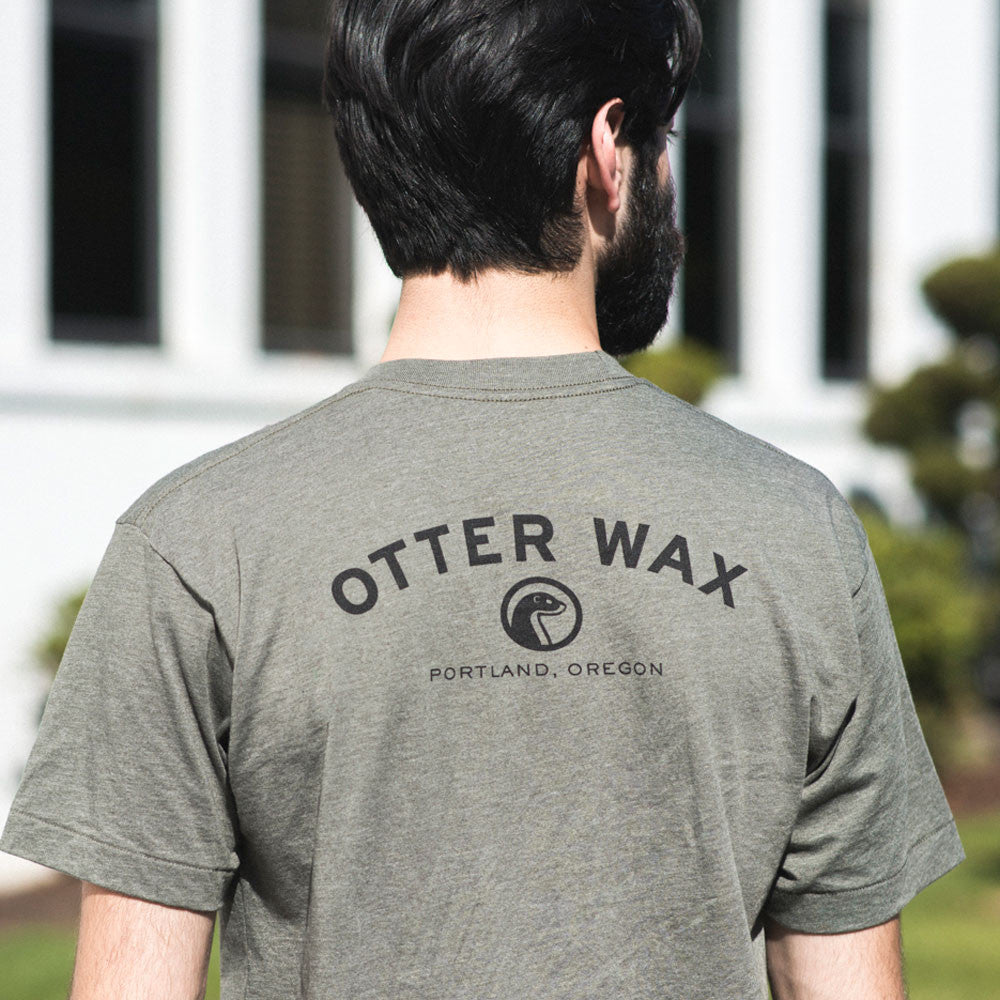 Otter Wax Fitted Cotton Unisex T-Shirt With Black Print Logo Front And Back In Heather Forest Lieutenant Green Color Made In The USA